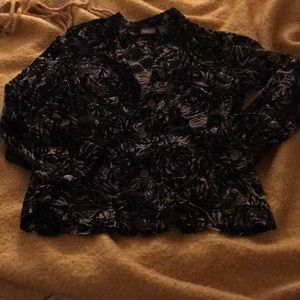 Black sheer shirt, with velvet embellishment.